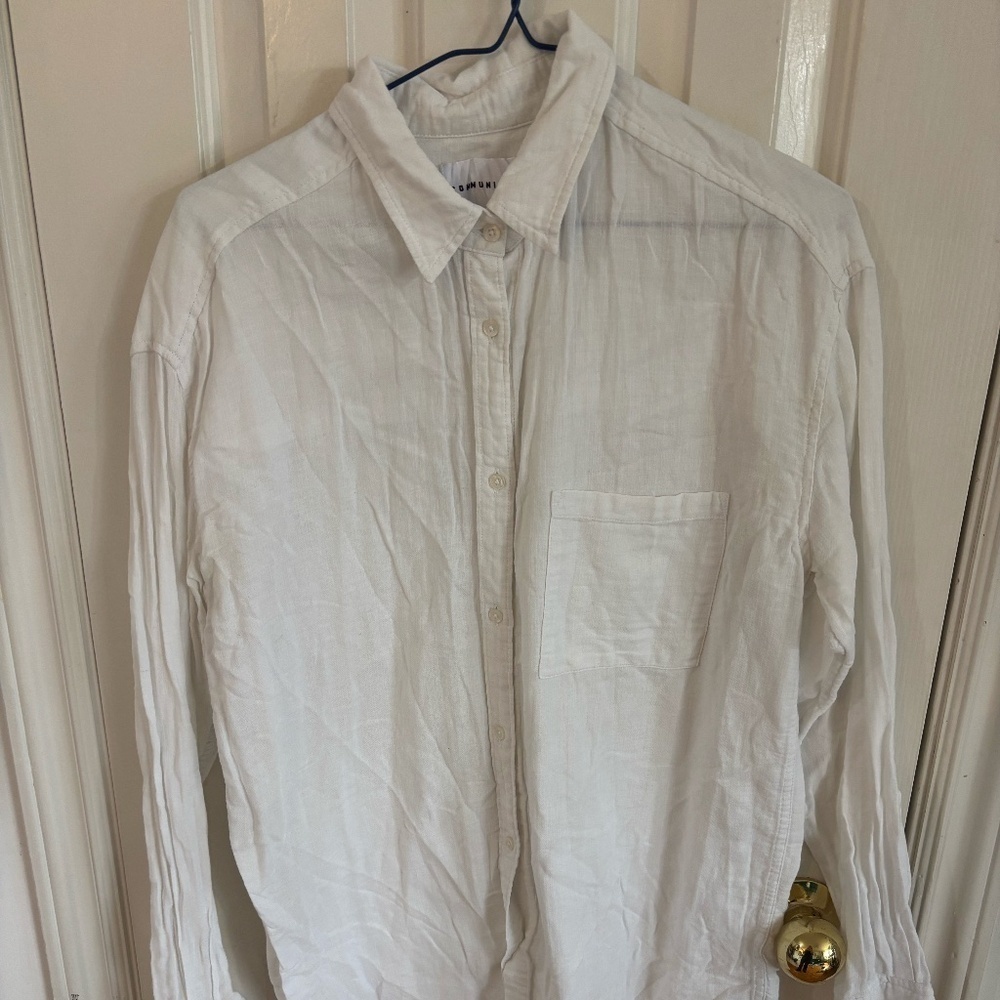 white button up " community" by Aritzia * accepting offers